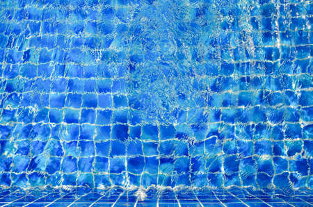 Blue water in swimming poolの写真素材
