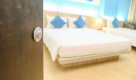Blurred  half-open the wooden old door blur bedroom  backgroundの写真素材