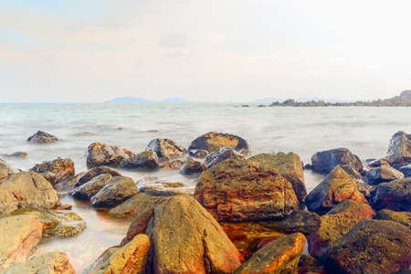 Long exposure tropical rocky beach at Laem Hua Mong - Kho Kwang Viewpoint in Chomphon province Thailandの写真素材