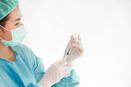 Doctor asian woman dressed in surgical uniform