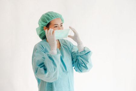 Doctor asian woman dressed in surgical uniform