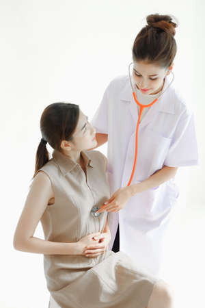 doctor take care woman patientの写真素材