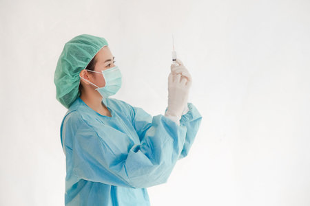 Doctor asian woman dressed in surgical uniform