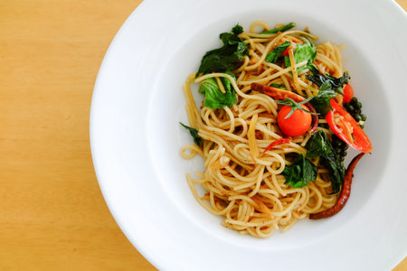 spaghetti spicy drunken, spicy stir fried noodle on table