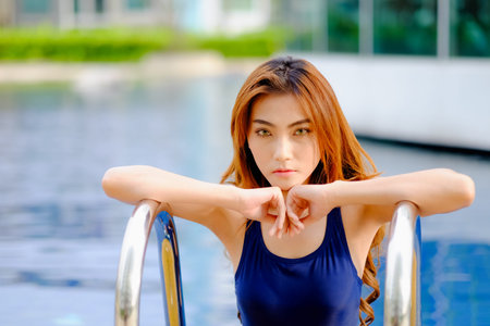 portrait asia sexy woman at swimming pool, fashion in summer season concept