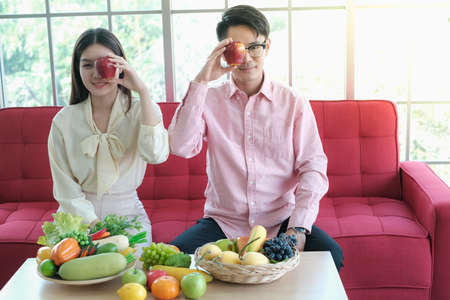 Portrait asian young couple in love, Healthy lifestyle and Food nutrition conceptの写真素材
