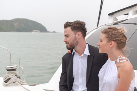 Portrait caucasian couple in love romance on luxury white yacht in ocean