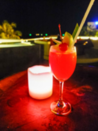 Abstract blurred cocktail or mock tail drinking on table