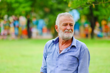 Portrait caucasian old man in park
