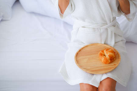 woman relax time on the bed in morning in rest dayの写真素材