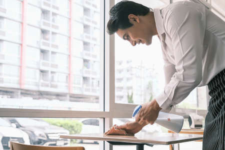 Asian man worker and cleaning conceptの写真素材