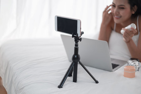 Portrait mini sexy asian woman review cosmetics live web camera online concept