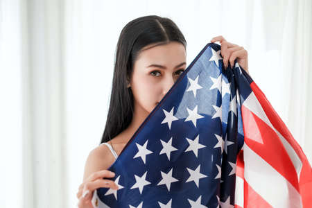 portrait sexy asia woman with USA flagの写真素材