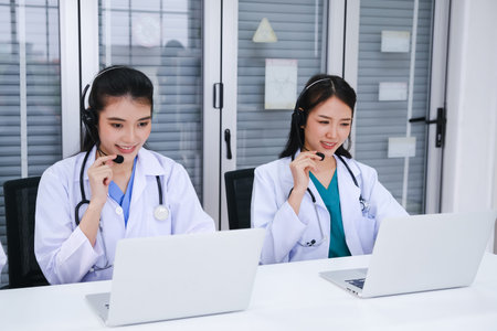 team doctor or nurse working call center operator with headset in hospital or workplace
