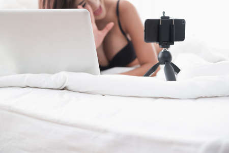 Portrait sexy asian woman wear lingerie or underwear, sexy live web camera online conceptの写真素材
