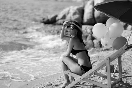 portrait asian woman sexy bikini in seaside happy life on summer seasonの写真素材