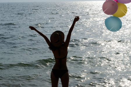 portrait asian woman sexy bikini in seaside happy life on summer seasonの写真素材