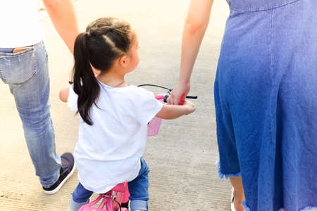 Happy asian family in the Parkの写真素材