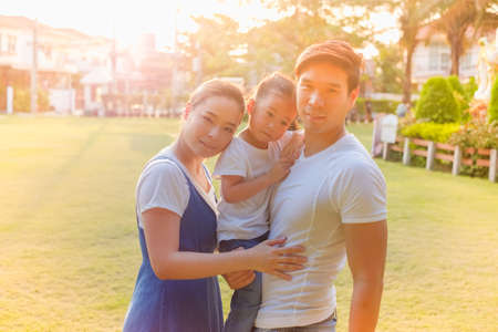 Happy asian family in the Parkの写真素材