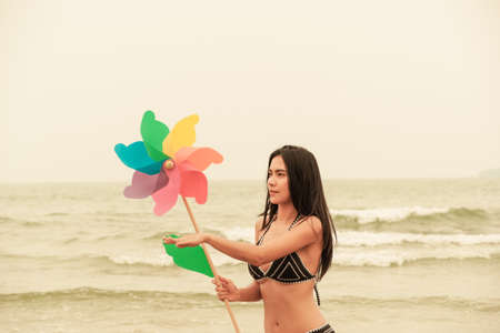 sexy asian woman wearing bikini on the beachの写真素材