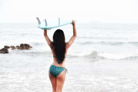 sexy asian woman wearing bikini on the beachの写真素材