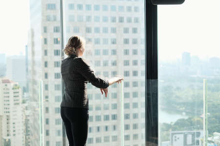 business caucasian woman relax coffee break in cafeの写真素材