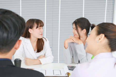 Asian business in seminar or employees group meeting in a conference roomの写真素材