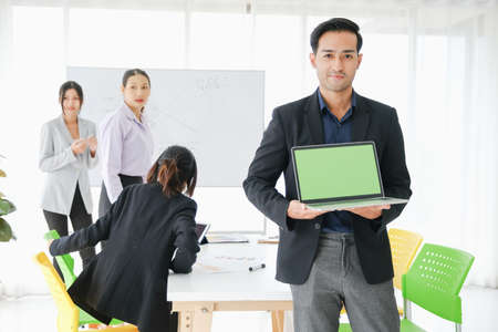 Asian business in seminar or employees group meeting in a conference roomの写真素材