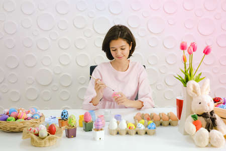 Portrait beautiful young asian girl with painted eggs, Happy easter dayの写真素材