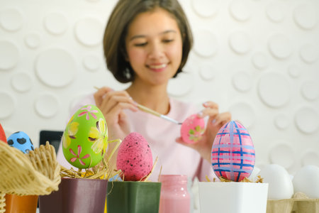 Portrait beautiful young asian girl with painted eggs, Happy easter day