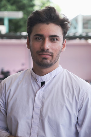 portrait South Asia male factory worker wearing a uniform