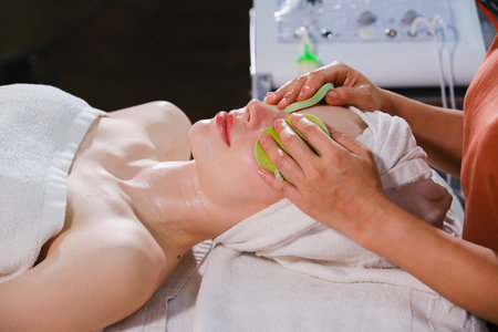caucasian white woman relaxing in spa massageの写真素材