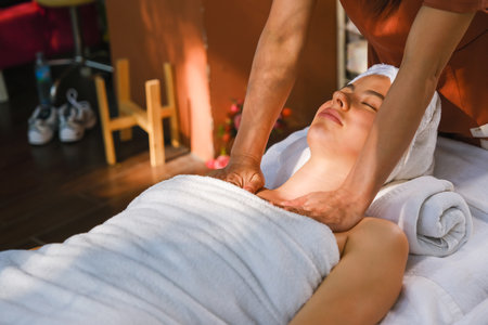 caucasian white woman relaxing in spa massageの写真素材