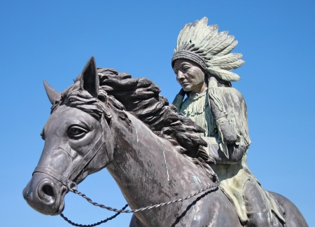 Statue of A Red indian or native American that riding a horse の写真素材