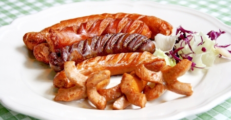 Smoked sausages and vegetablesの写真素材