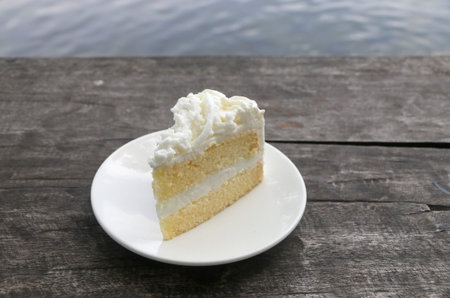 Coconut cake on wooden table