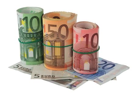 Rolls of various Euro banknotes isolated on white.の写真素材