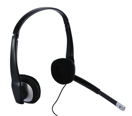 Black headset (focus on microphone) isolated on white with nobody in shot.の写真素材