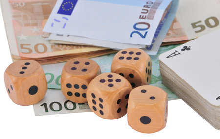 Five wooden dice, deck of cards and Euro bank notes, isolated on white.