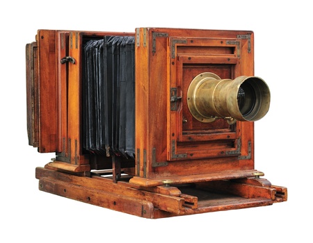Old wooden folding camera isolated on white.の写真素材