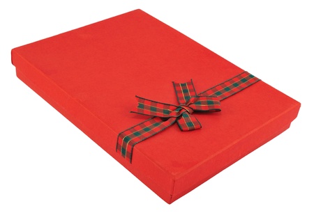 Red gift box, decorated with cloth ribbon, isolated on white.の写真素材