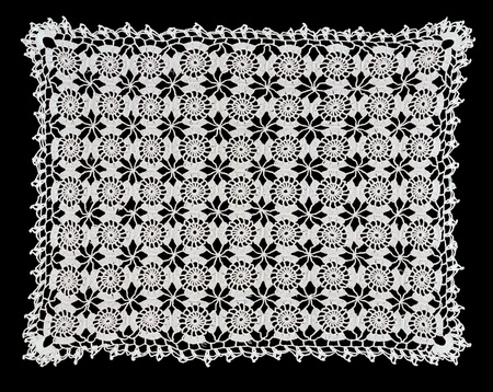 White handmade lace (rectangle form), isolated on black.の写真素材
