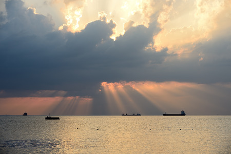 Sunset in Trieste harbour with cloudy skies - Italyの写真素材