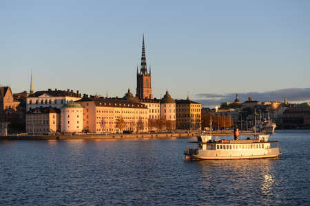 Stockholm sunset view with The Riddarholm Church which is one of the oldest buildings of Stockholm.の写真素材