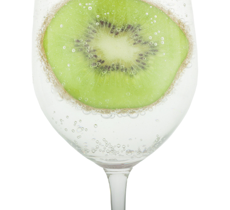 Kiwi in water with glassの写真素材