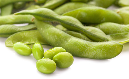 Fresh peas isolated on white backgroundの写真素材