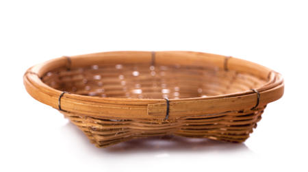 vintage weave wicker basket isolated on white backgroundの写真素材