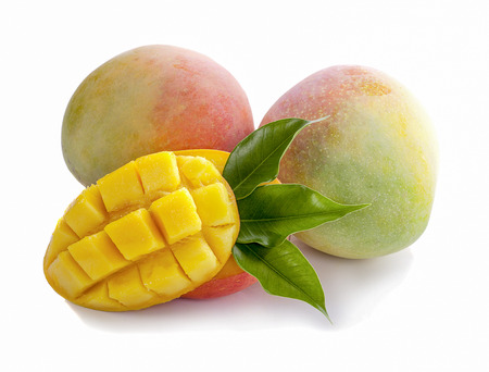 Mango cubes and slices. Isolated on a white background.の写真素材