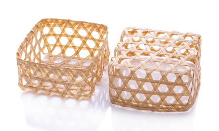 Wooden basket isolated on white backgroundの写真素材