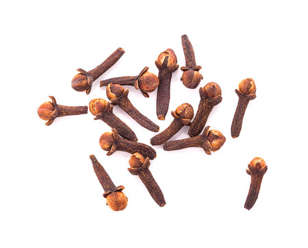 dry cloves on white background